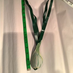 Shadow dancer vintage green onion tin wall hanging